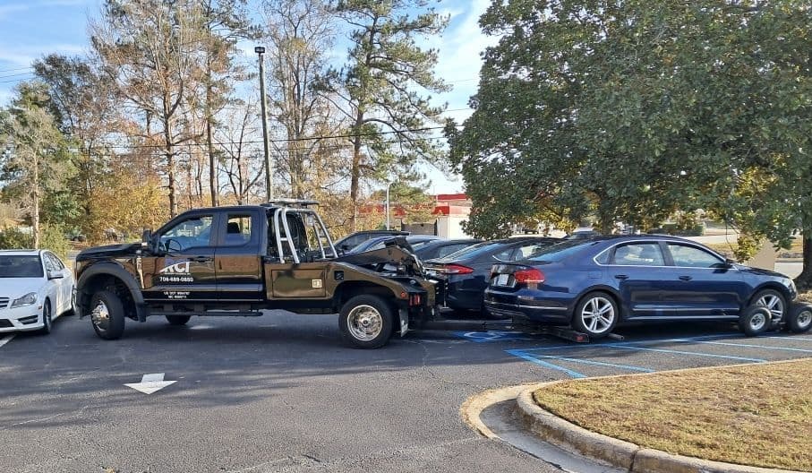 RCI wrecker recovering sedans in Columbus, Georgia