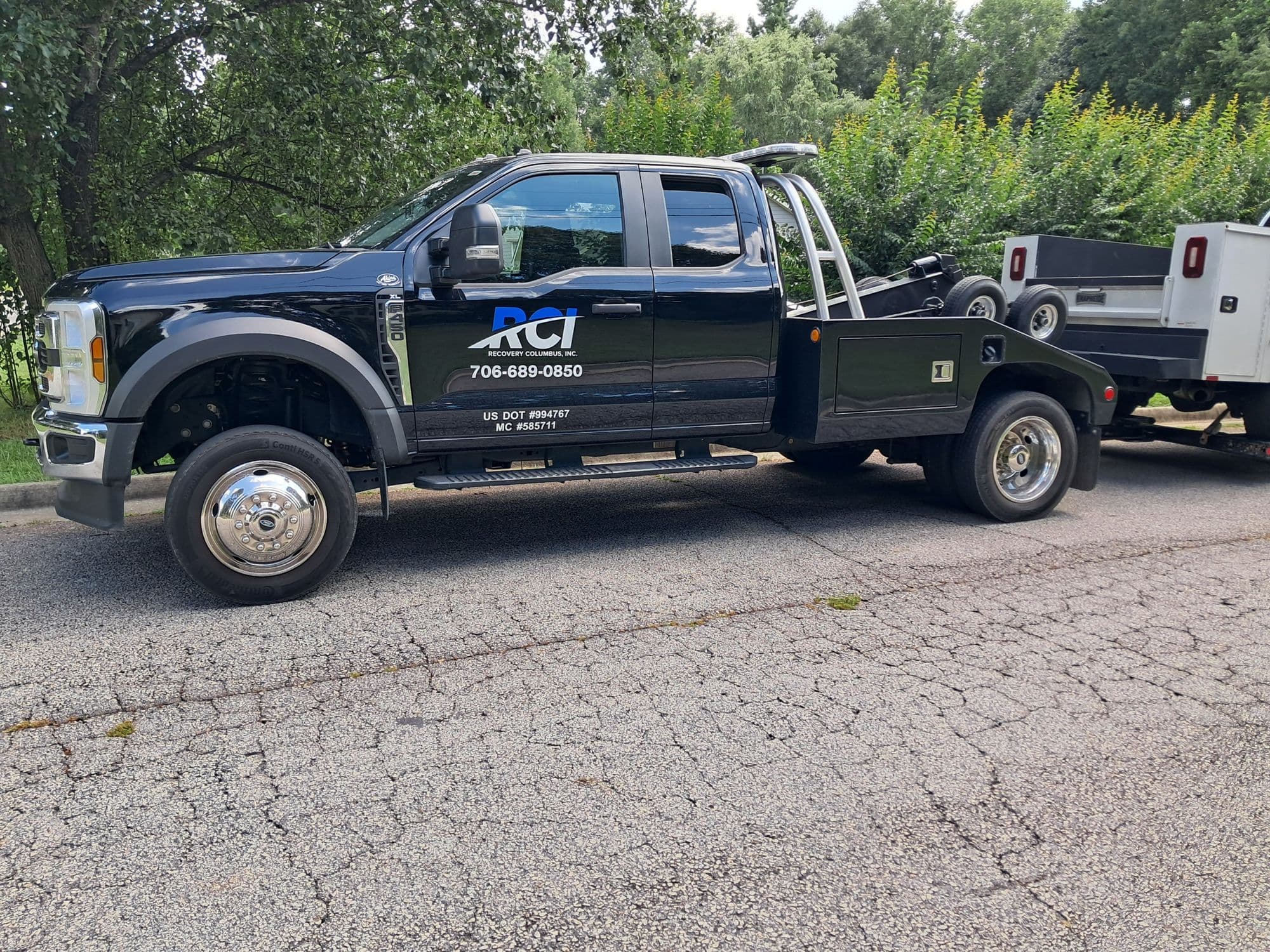 RCI black F-450 recovery truck